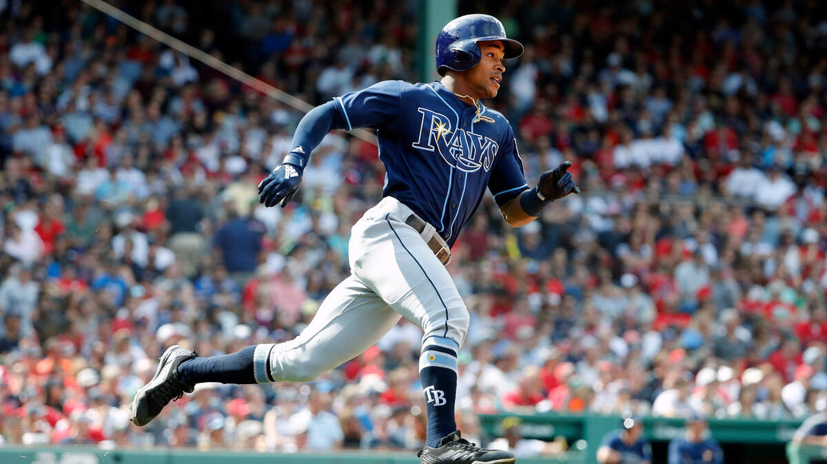 Tampa Bay Rays’ Mallex Smith runs out a hit against the Boston Red Sox during the fourth inning of a baseball game Sunday, Aug. 19, 2018, in Boston. (AP Photo/Winslow Townson)