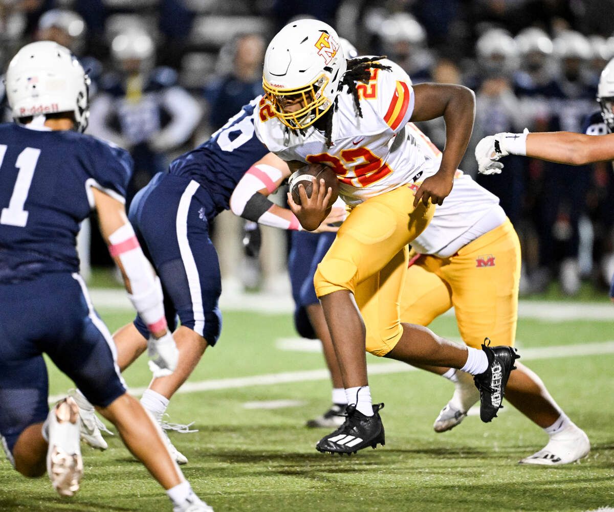 Mount Tahoma’s Keshawn Hines (22) carries the ball against Bellarmine Prep during the first half of the game at Bellarmine Preparatory School, on Friday, Oct. 11, 2024, in Tacoma, Wash.