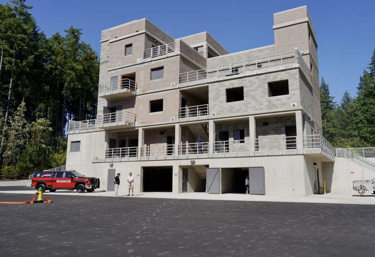 The Gig Harbor Fire & Medic One training tower is five stories tall and 17,051 square feet, featuring various rooms and corridors where firefighters can practice putting out fires in commercial storefronts, apartments and other structures.