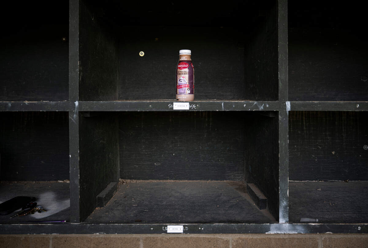 A Darigold chocolate milk sits in the dugout in honor of Reese Widman, at Steilacoom High School, on Monday, April 15, 2024, in Steilacoom, Wash. It was his favorite.