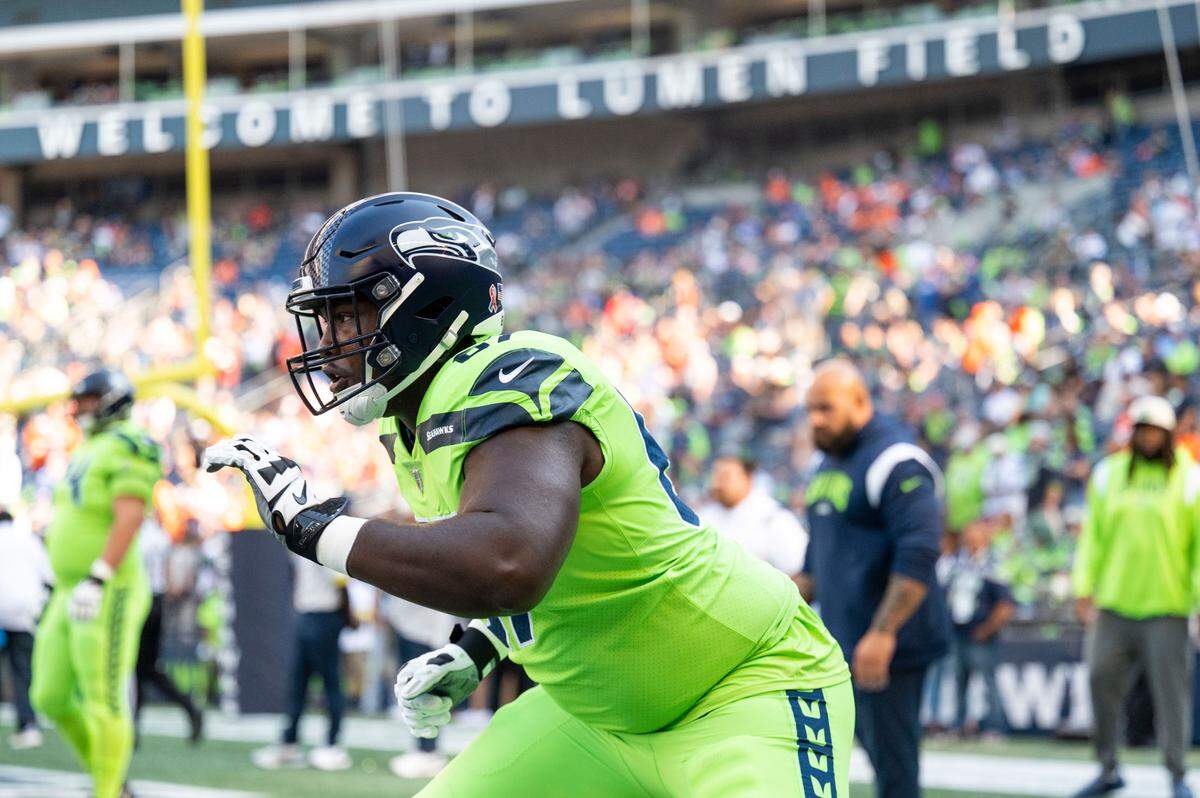 Seattle Seahawks offensive tackle Charles Cross (67) warms up prior to the start of an NFL game against the Denver Broncos on Monday, Sept. 12, 2022, at Lumen Field in Seattle.