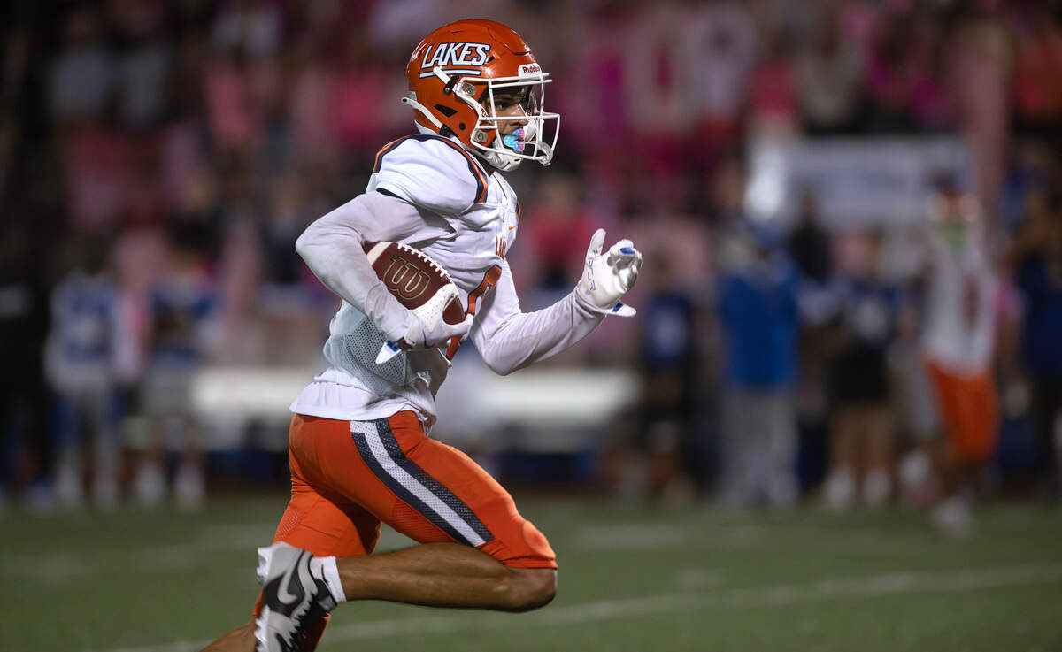 Lakes wide receiver Exavier McChristian breaks loose for the game-winning touchdown reception during Friday night’s football game against the Curtis Vikings at Viking Stadium in University Place, Washington, on Sept. 20, 2024. After trailing 10-0, Lakes won the game, 14-10.