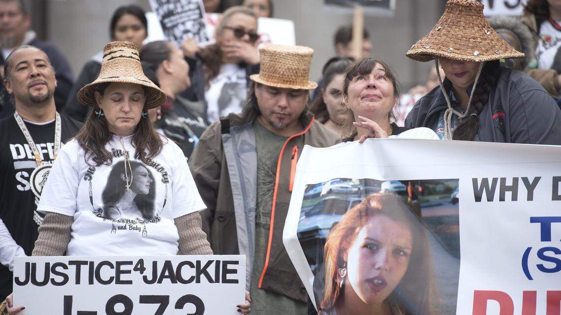 Lisa Earl (second from left) of Tacoma is comforted by Lucia Earl-Mitchell as they stand with Puyallup Tribal Council members (from left) David Bean, Annette Bryan and Clinton McCloud along with about 300 others during a rally to end police brutality on the Capitol steps in Olympia on  Oct. 20, 2016. Lisa Earl is the mother of Puyallup tribal member Jackie Salyers, who along with her unborn child, was shot and killed by a Tacoma police officer.