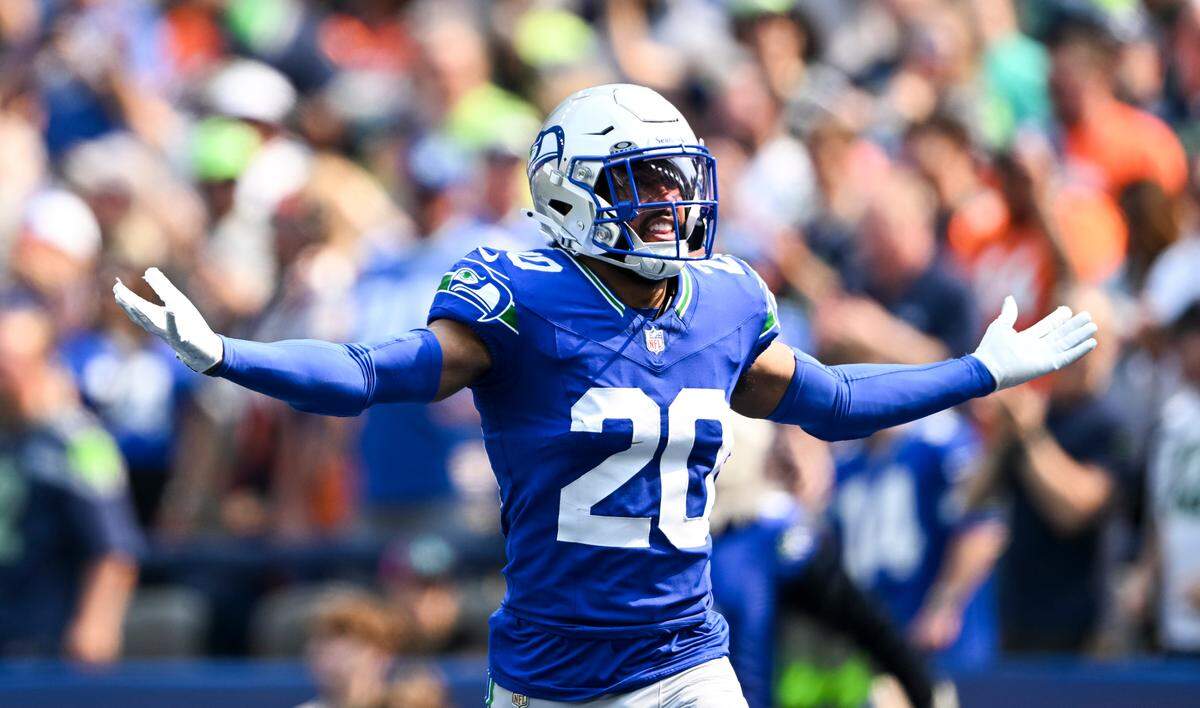Seattle Seahawks safety Julian Love (20) reacts to a interception against the Denver Broncos during the second quarter of the game at Lumen Field, on Sunday, Sept. 8, 2024, in Seattle, Wash.