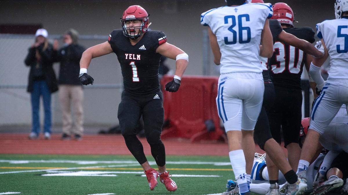 Yelm linebacker Ray Wright celebrates a quarterback sack during Saturday afternoon’s 3A football state playoff game against the Seattle Prep Panthers at Yelm High School in Yelm, Washington, on Nov. 13, 2021. Yelm won the game, 52-28.