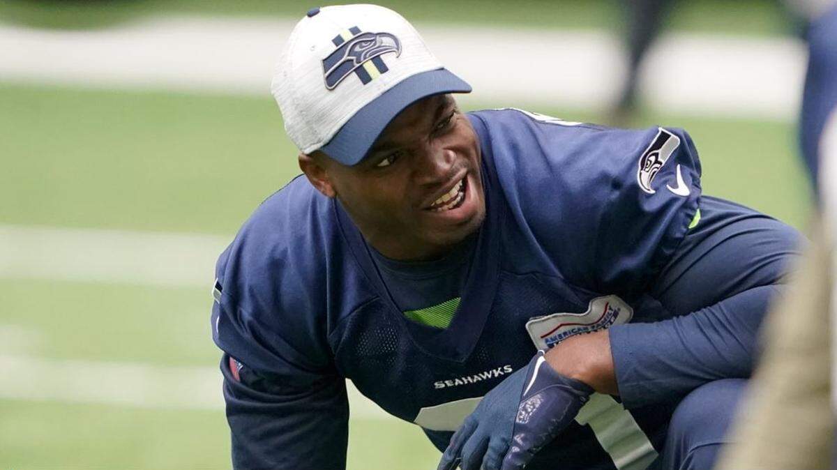 Adrian Peterson, the 36-year-old running back and 2012 NFL most valuable player, at his first practice with the Seahawks on Thursday, Dec. 2, 2021, at the team’s indoor facility in Renton.