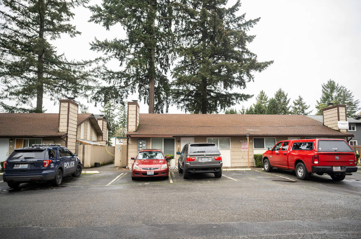 Firefighters with West Pierce Fire & Rescue investigate an apartment fire where a man was found dead at the 12900 block of Lincoln Avenue Southwest in Lakewood Wash. on Jan. 4, 2023. Fire officials said the blaze only burned in the unit where the victim was found.