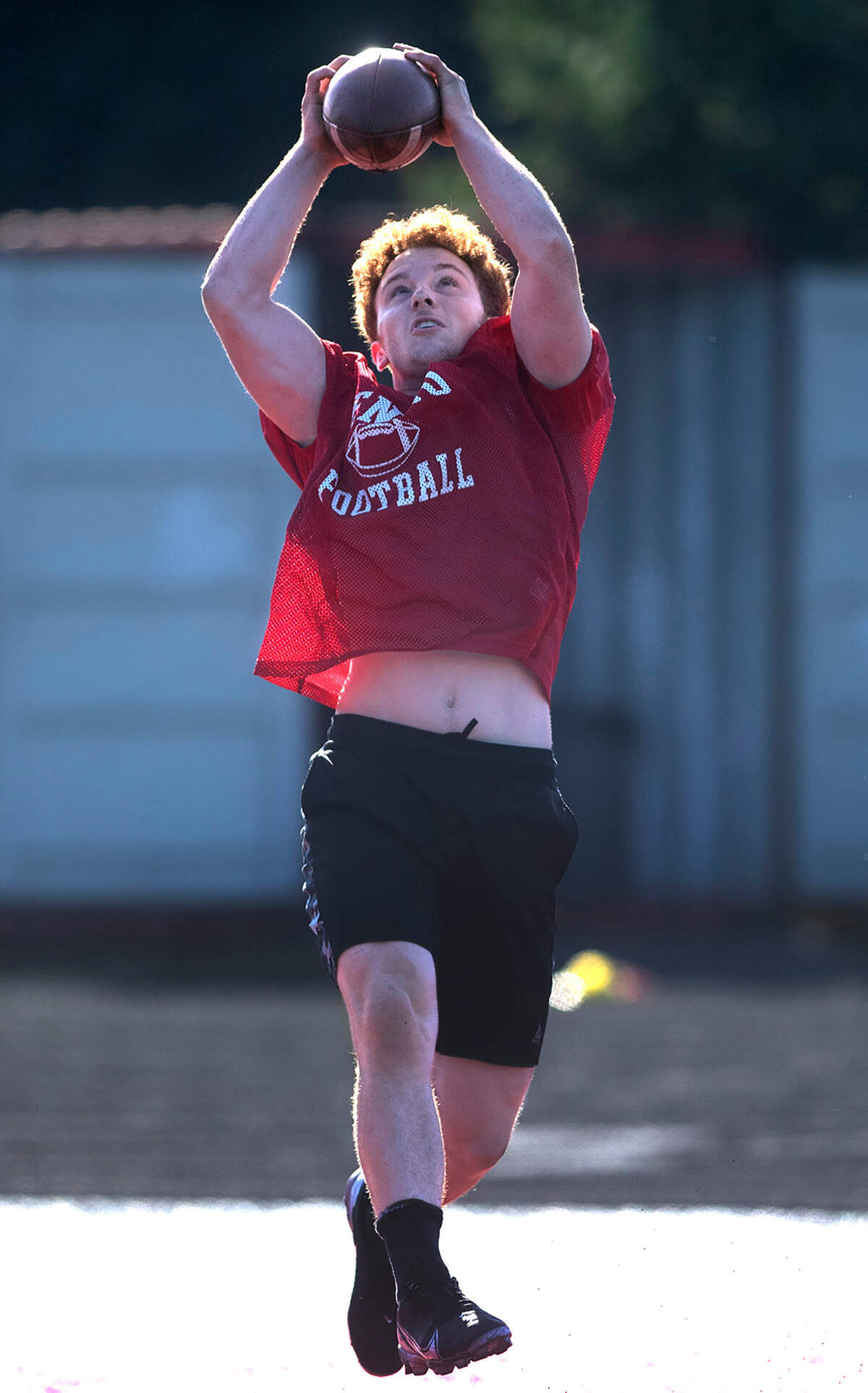 Tenino senior running back Randall Marti pulls down a pass during football practice at Tenino Beaver Stadium in Tenino, Washington on Thursday, Aug. 25, 2022.