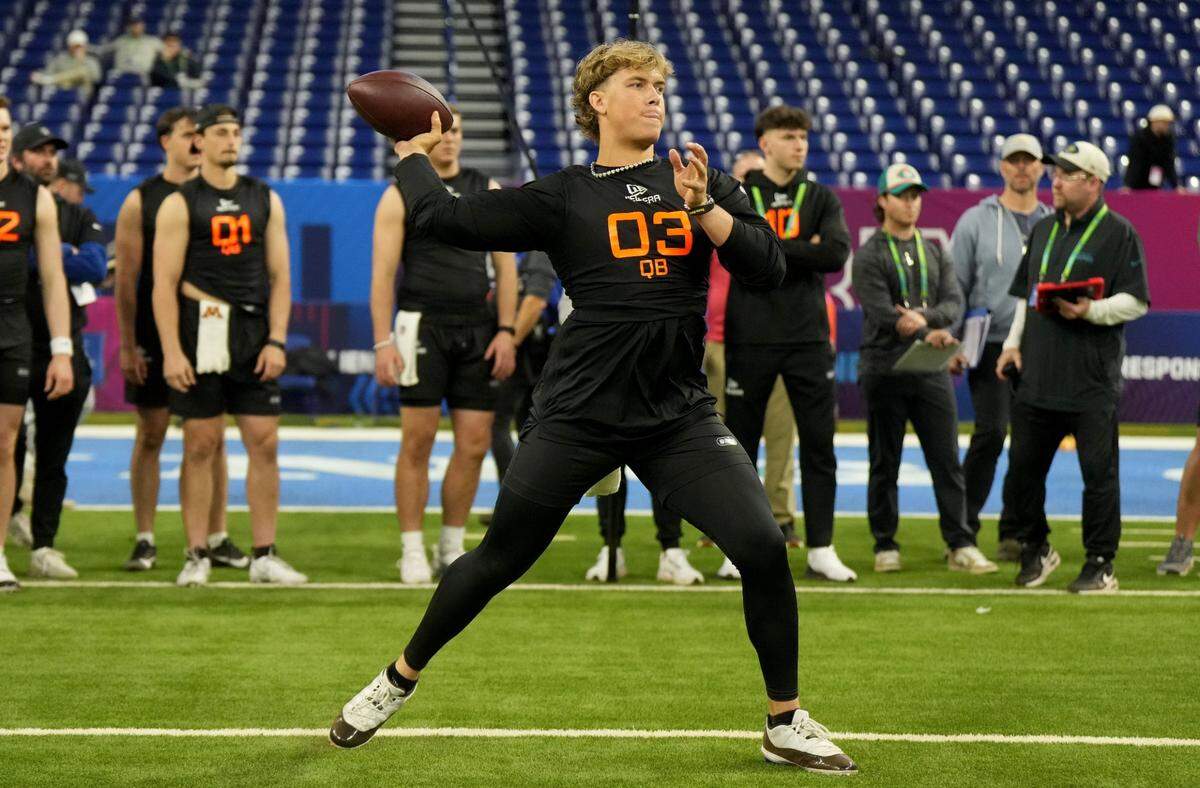 Mar 1, 2025; Indianapolis, IN, USA; Mississippi quarterback Jaxson Dart (QB03) during the 2025 NFL Combine at Lucas Oil Stadium. Mandatory Credit: Kirby Lee-Imagn Images