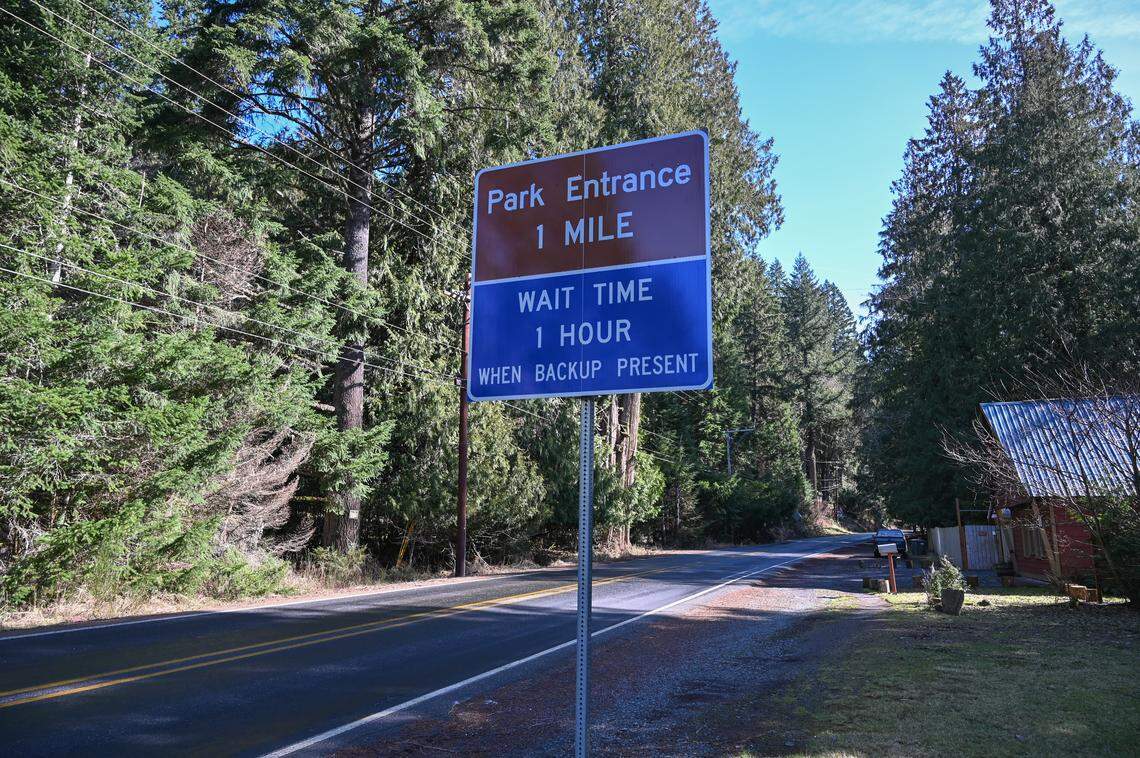 Department of Transportation installed signage along State Route 706 indicating estimated visitor wait time.