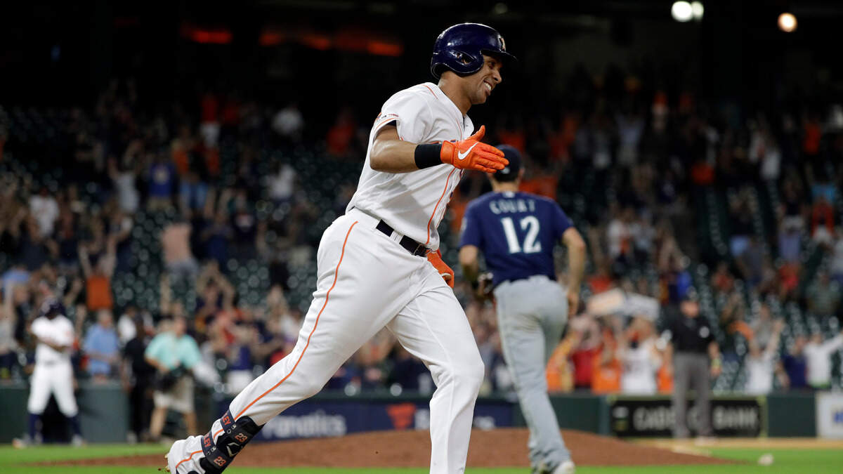 Houston Astros’ Michael Brantley runs the bases after hitting a game-winning two-run home run against the Seattle Mariners during the 13th inning of a baseball game Thursday, Sept. 5, 2019, in Houston. The Astros won 11-9.