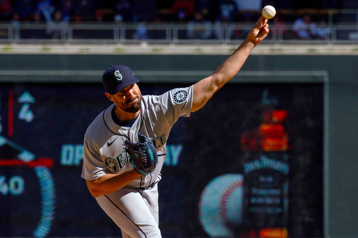 Seattle Mariners starting pitcher Robbie Ray (38) throws against the Minnesota Twins in the second inning of a baseball game, Friday, April 8, 2022, in Minneapolis. (AP Photo/Nicole Neri)