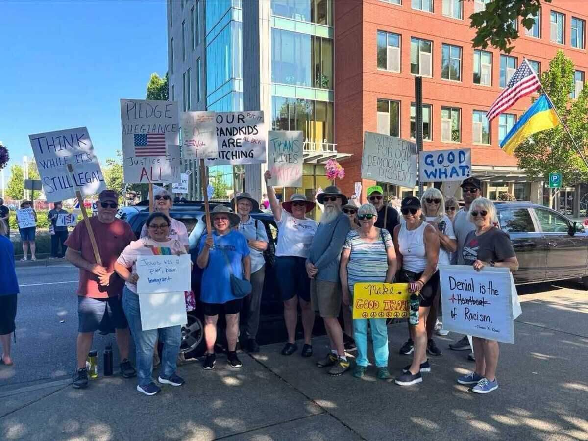 Protesters gathered outside City Hall on the day of the comprehensive plan vote, July 22, 2025.