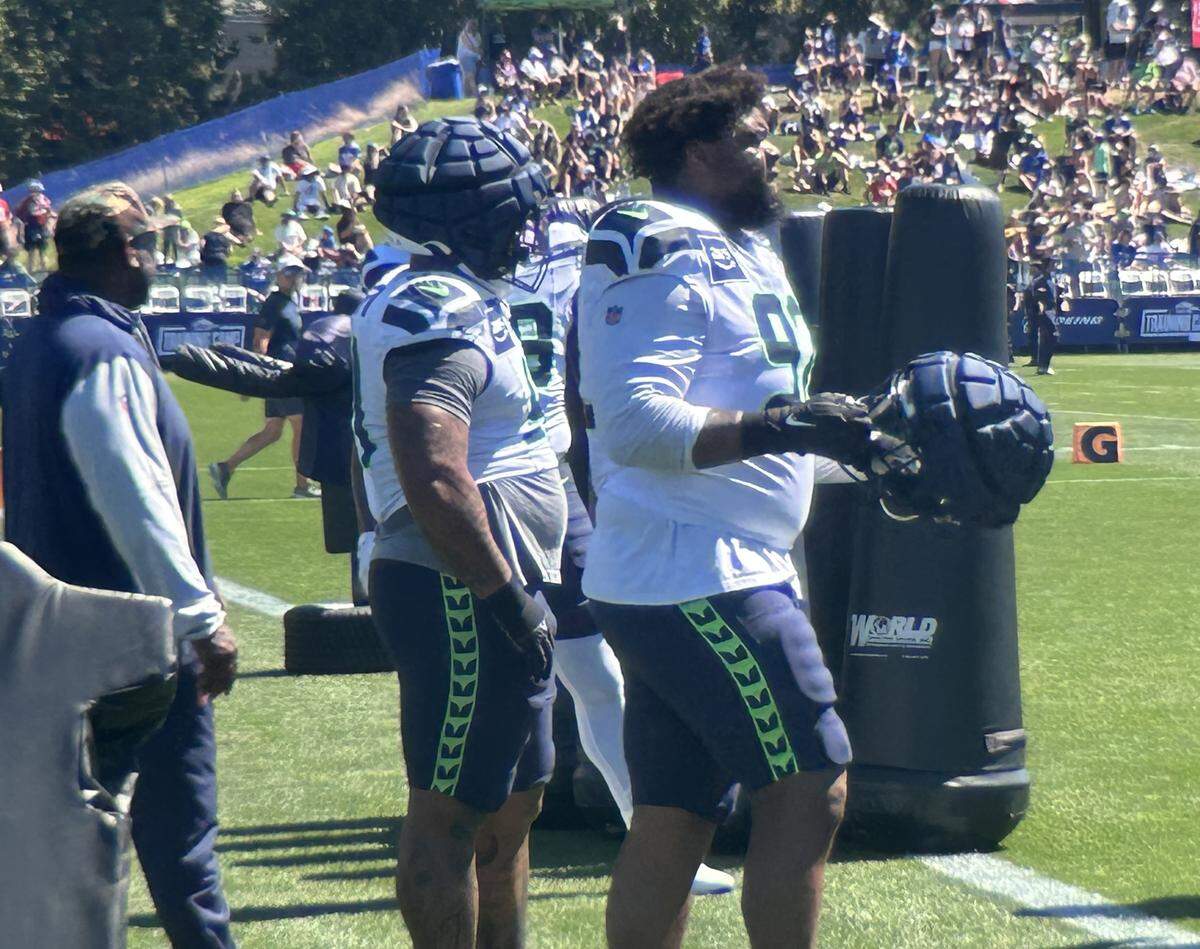 Defensive tackle Quinton Bohanna (right, 92) at the 17th practice of Seattle Seahawks training camp Tuesday, Aug. 12, 2025, at the Virginia Mason Athletic Center in Renton.