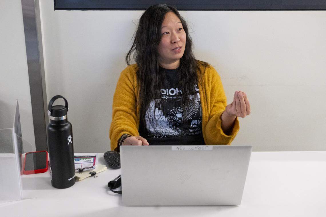 Samie Iverson, the library social worker for Tacoma Public Library, speaks with The News Tribune on Friday, Dec. 5, 2025, at the Main Branch in Tacoma, Wash. Iverson offers social work support from tables set up regularly at Tacoma library branches.