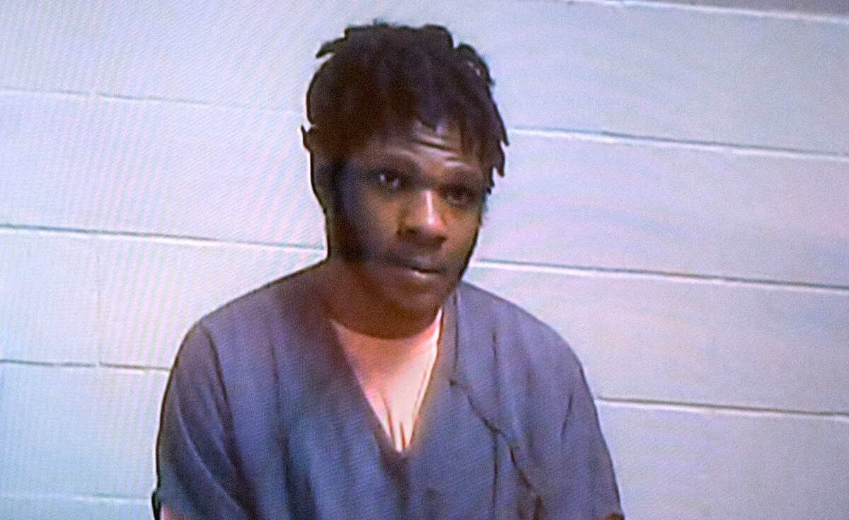 Jadan Maurice Davis-Gunn appears via video for his arraignment on first-degree assault and unlawful possession of a firearm for a road-rage shooting on Interstate 5 on Nov. 25. He is shown on screen in Pierce County Superior Court in Tacoma, Washington, on Wednesday, Nov. 30, 2022.