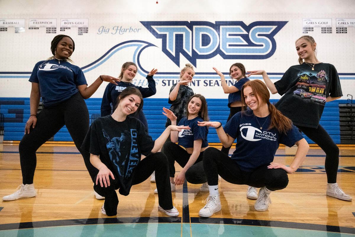 The H2Whoa Gig Harbor high school dance team poses for a picture at practice in the gym in Gig Harbor, Wash. on Wednesday, March 2, 2022.
