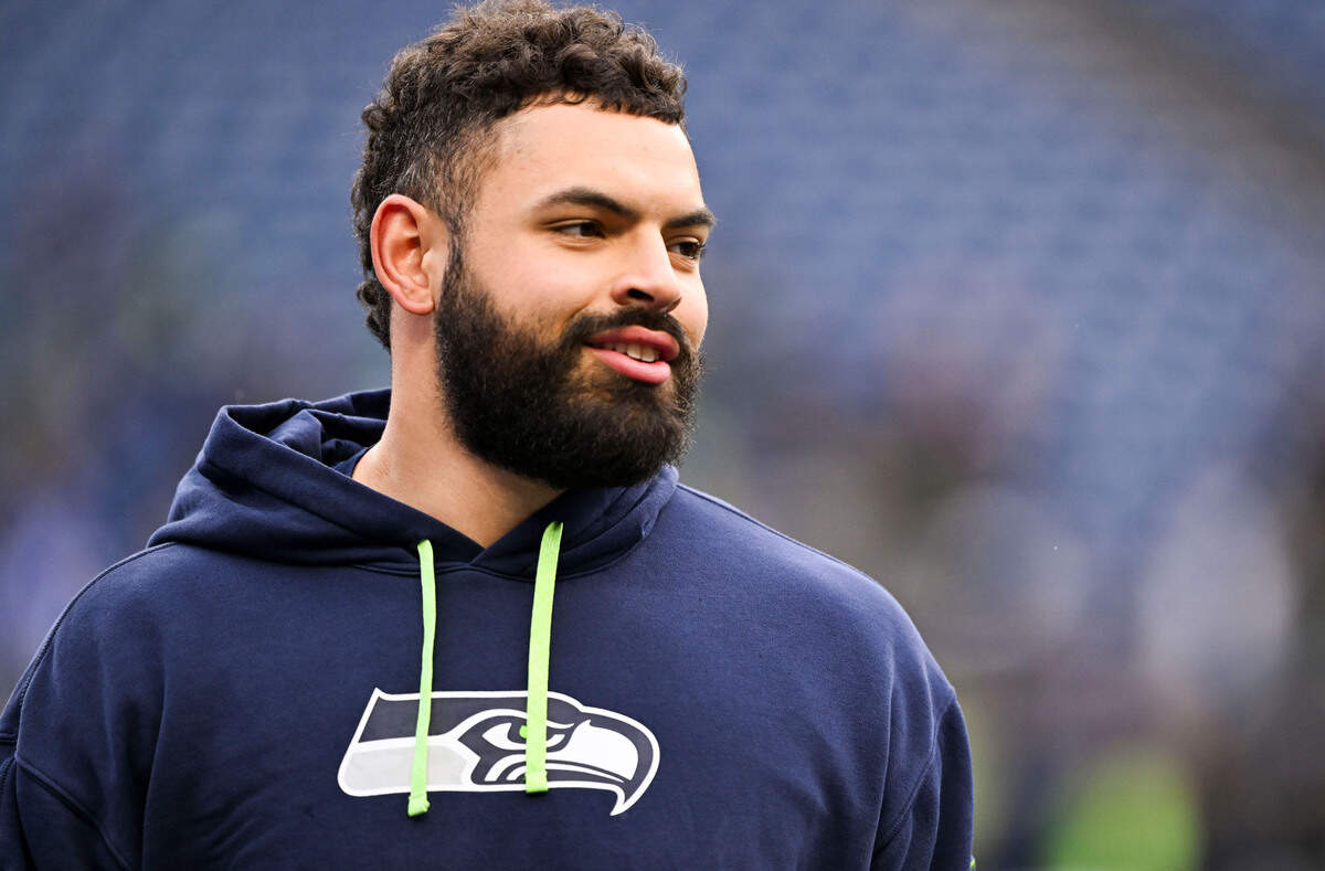 Seattle Seahawks offensive tackle Abraham Lucas (72) warms up before the game against the Arizona Cardinals at Lumen Field, on Sunday, Nov. 24, 2024, in Seattle, Wash.