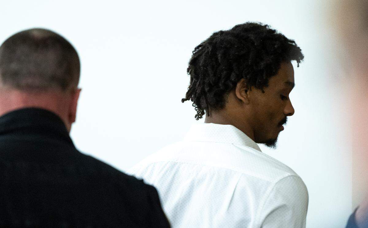 Maleke Pate is taken back to jail after being convicted Friday of four counts of aggravated first-degree murder in the October 2021 murder of four people in Tacoma.