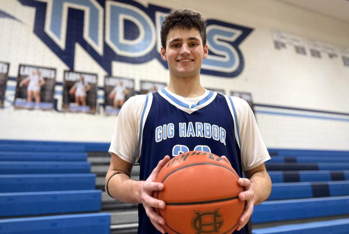 Gig Harbor High School 6-foot-8 senior forward Michael Masini is averaging 25.4 points and 12.1 rebounds per game in the 2025-26 season for the Tides.