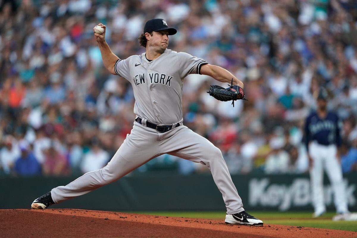 New York Yankees starting pitcher Gerrit Cole throws to a Seattle Mariners batter during the first inning of a baseball game Tuesday, Aug. 9, 2022, in Seattle. (AP Photo/Ted S. Warren)