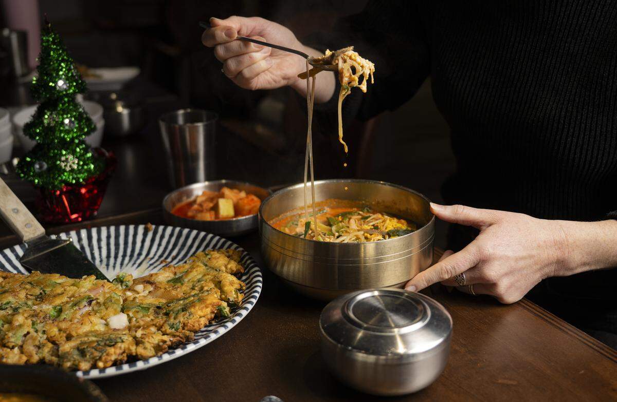 In an untraditional move, Jin Yi developed recipes for other Korean soups, such as sukgaejang (spicy beef), with the ox-bone broth as their base. Yi’s seafood pancake is also among the best in the region.