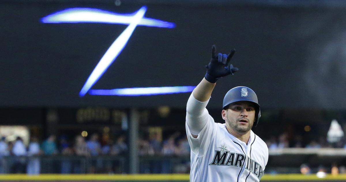 Seattle Mariners' Mike Zunino rounds the bases as a "Z" is flashed on a video board after he hit a home run against the New York Yankees during a baseball game, Saturday, July 22, 2017, in Seattle. (AP Photo/Ted S. Warren)