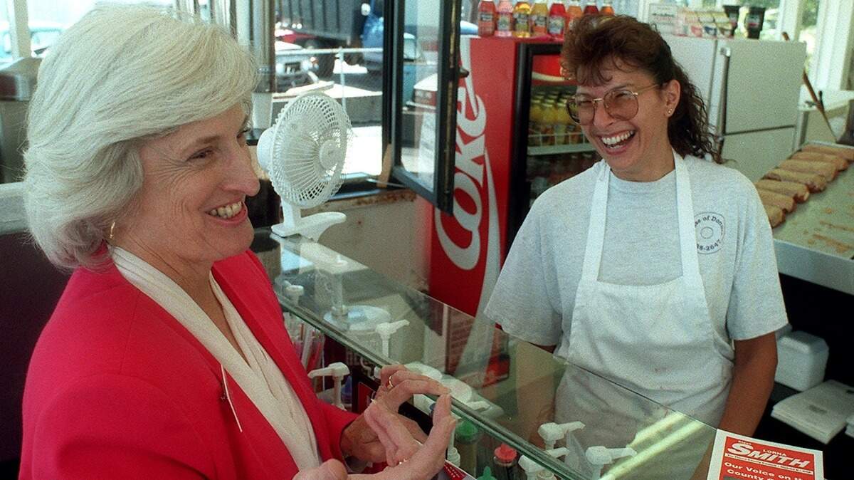 Lorna Smith, then a candidate for Pierce County Council, talks with Christine Smith at the House of Donuts in Lakewood in 1996.