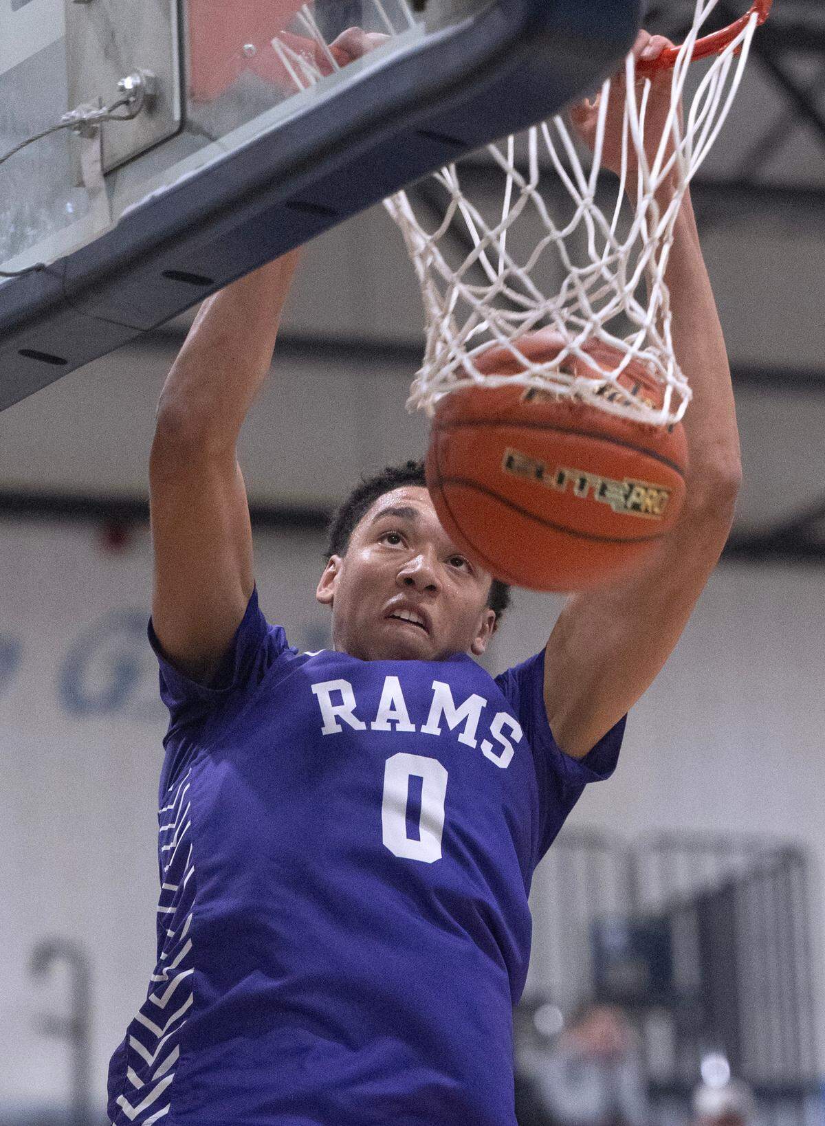 North Thurston’s Ray Adams throws down a breakaway dunk during Friday night’s 3A SSC boys basketball game against the Gig Harbor Tides at Gig Harbor High School in Gig Harbor, Washington, Jan. 5, 2024. After a fourth-quater rally by Gig Harbor tied the game at 45-45 in the final three minutes, North Thurston pulled away to win the game, 56-45.
