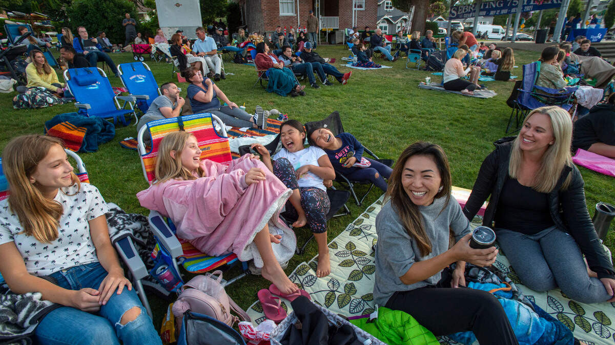 A group of women attend the city of Gig Harbor’s annual summer outdoor film series Movies in the Park in 2021. Pierce County Parks & Recreation will offer free outdoor movies in the summer of 2026.