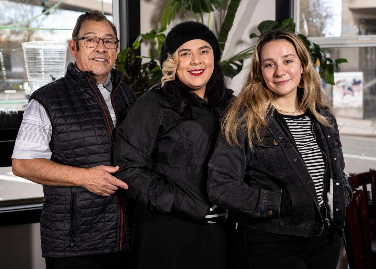 3uilt owners, Anna Gonzales, and her father, Edward Gonzales, pose with Anna’s niece and Edward’s granddaughter, Alyssa Hernandez, right, for a portrait at their new 3uilt location at 1101 Tacoma Avenue on February 21, 2022, in Tacoma, Wash. Three generations of the family help run both restaurant locations in Tacoma.