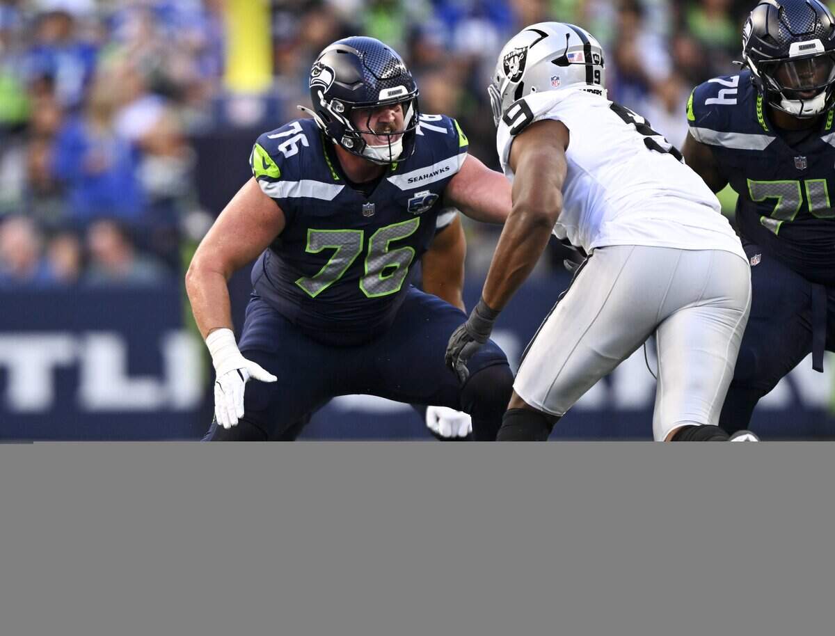 Seattle Seahawks guard Grey Zabel (76) blocks Las Vegas Raiders defensive end Tyree Wilson (9) during the first quarter of the game at Lumen Field, on Thursday, Aug. 7, 2025, in Seattle, Wash.