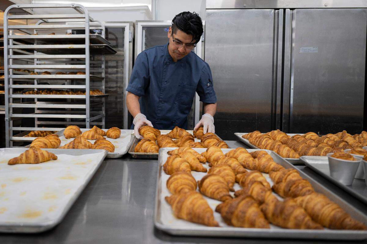 Miguel Silva-Glenn brings years of kitchen experience to Lobo Bakery, which he owns and operates with his wife Keely. Ahead of Mother’s Day weekend, they prepped upwards of 1,000 croissants in varying shapes and flavors, including the classic butter.