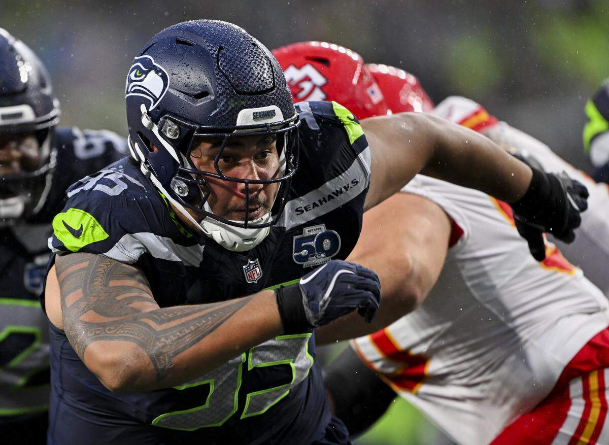 Seattle Seahawks defensive tackle Brandon Pili (95) gets through Kansas City Chiefs offensive line during the second quarter of the preseason game at Lumen Field, on Friday, Aug. 15, 2025, in Seattle.