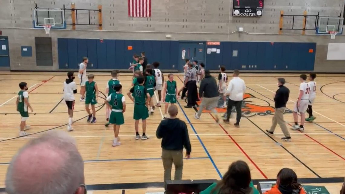 Eighth-grade basketball players play at Kenmore Middle School on Dec. 16, 2021. A player’s father was charged with second-degree assault and accused of shoving a referee to the ground during the game, deputies said.