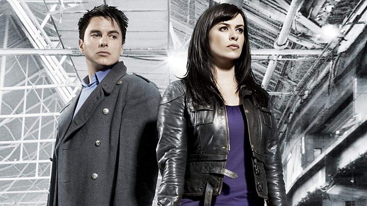 John Barrowman and Eve Myles in a publicity photo from “Torchwood”. Torchwood is a team of people whose job is to investigate the unusual, the strange and the extraterrestrial.