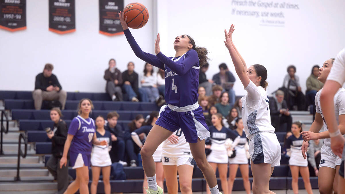 North Thurston’s Shayla Cordis flies to the basket in front of Bellarmine defender Kyla Frazier during Friday night’s girls basketball game at Bellarmine Preparatory School in Tacoma, Washington, on Jan. 17, 2025.