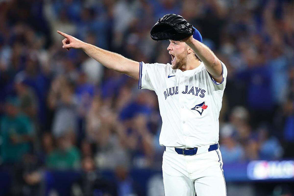 TORONTO, ONTARIO - OCTOBER 19: Trey Yesavage #39 of the Toronto Blue Jays celebrates after an inning-ending double play against the Seattle Mariners during the fourth inning in game six of the American League Championship Series at Rogers Centre on October 19, 2025 in Toronto, Ontario. (Photo by Vaughn Ridley/Getty Images)