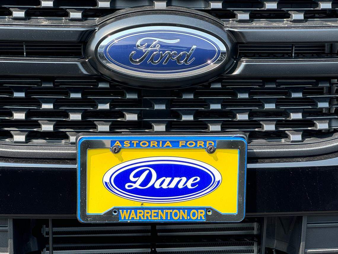 As this Astoria, Oregon car dealership illustrates, the state has not yet implemented durable temporary license plates.