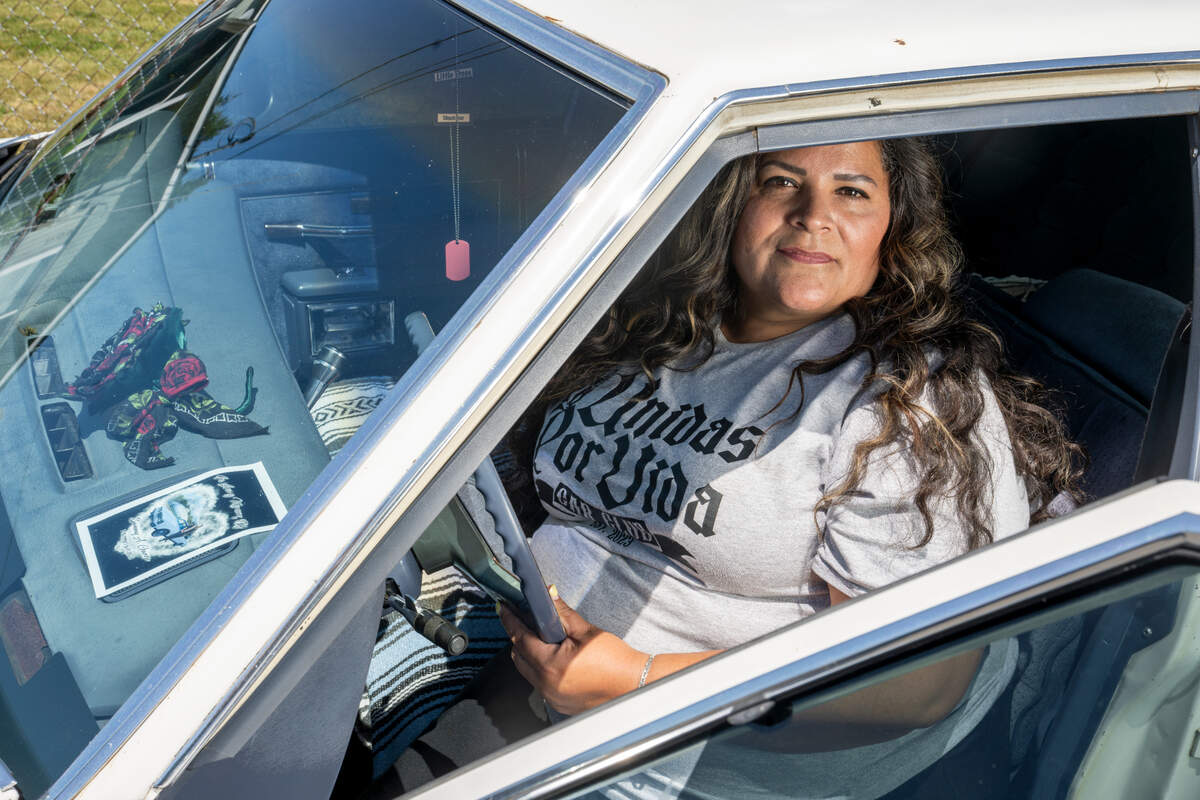Elisa Gonzalez sits in her son Samuel Antonio Garza Gonzalez’s car, a 1983 Oldsmobile Delta 88 on Thursday, June 5, 2025, in Tacoma, Wash. His death in a shooting and his love for cars inspired the creation of a nonprofit women’s car club, Unidas Por Vida.