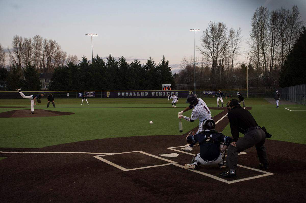 Puyallup High School center fielder Donte Grant bats during a game against Olympia on Thrusday, April 8, 2021 at Heritage Recreation Center in Puyallup, Wash.
