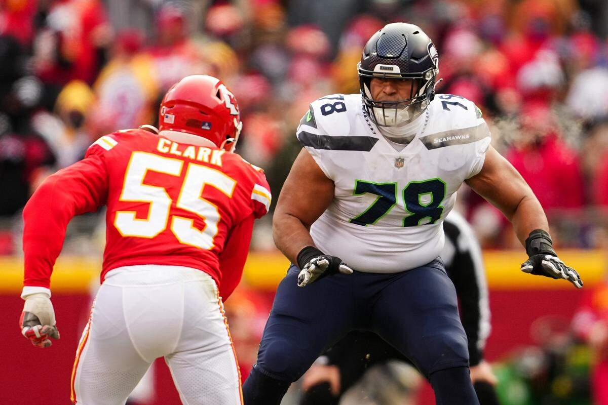 Dec 24, 2022; Kansas City, Missouri, USA; Seattle Seahawks offensive tackle Stone Forsythe (78) looks to block Kansas City Chiefs defensive end Frank Clark (55) during the second half at GEHA Field at Arrowhead Stadium. Mandatory Credit: Jay Biggerstaff-USA TODAY Sports