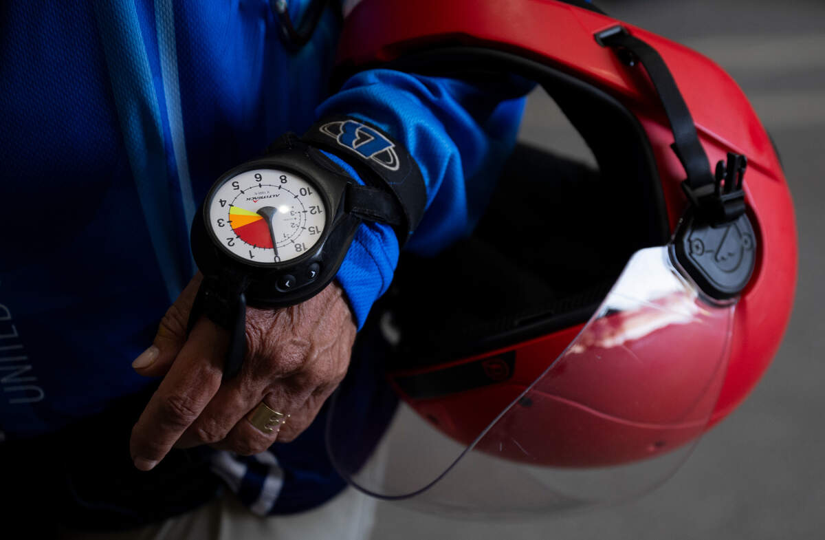 Jessie Farrington suits up to go for a jump at Skydive Kapowsin, on Monday, June 9, 2025, in Shelton. The 75 year old has been parachuting since she was 15 years old.