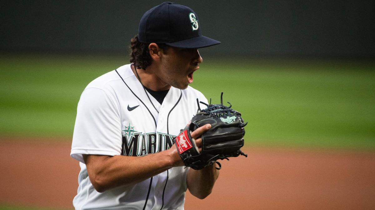 Seattle Mariners starting pitcher Marco Gonzales (7) reacts after a double play during the first inning. The Seattle Mariners played the San Francisco Giants in a Major League Baseball game at T-Mobile Park in Seattle, Wash., on Thursday, April 1, 2021.