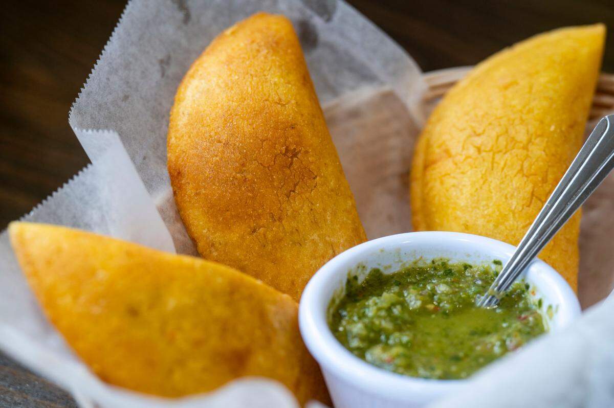 El Parche serves about 800 empanadas every week, accompanied by aji, a staple condiment of cilantro, serrano, onions and lime.