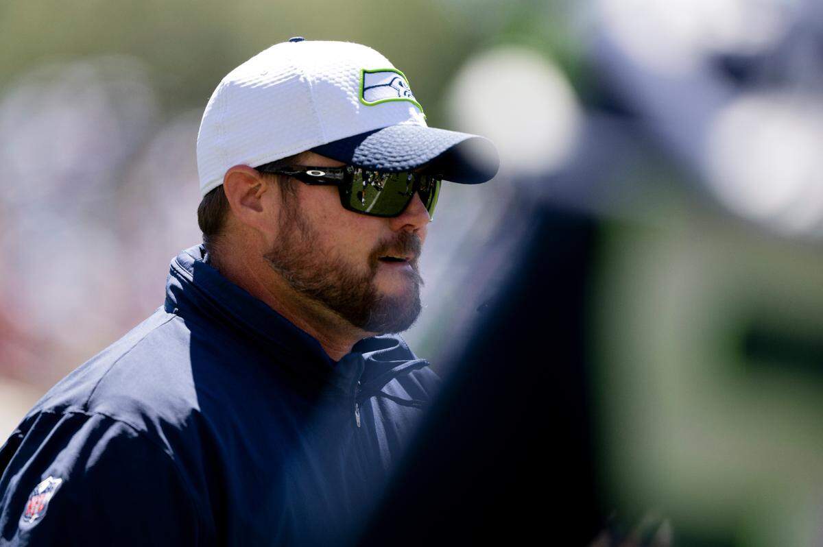 Seahawks offensive line coach Scott Huff coaches players during the first day of training camp at the Virginia Mason Athletic Center, on Wednesday, July 24, 2024, at the Virginia Mason Athletic Center in Renton.