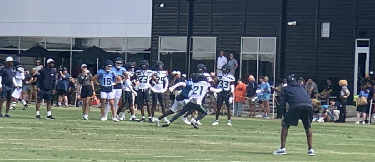 Seahawks Pro Bowl cornerback Devon Witherspoon (21) goes one on one against Titans wide receiver Kearis Jackson in a joint practice in Nashville, Tennessee, Aug. 14, 2024.