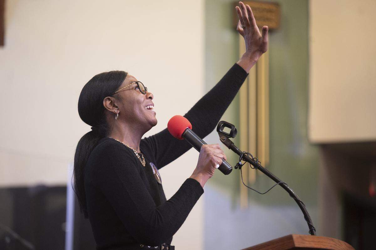 Sharyce Martin, granddaughter of Bishop Curtis E. Montgomery, sings at an honorary street renaming ceremony for Curtis E. Montgomery Street on Saturday, Dec. 27, 2025, at Greater Christ Temple Church in Tacoma, Wash.