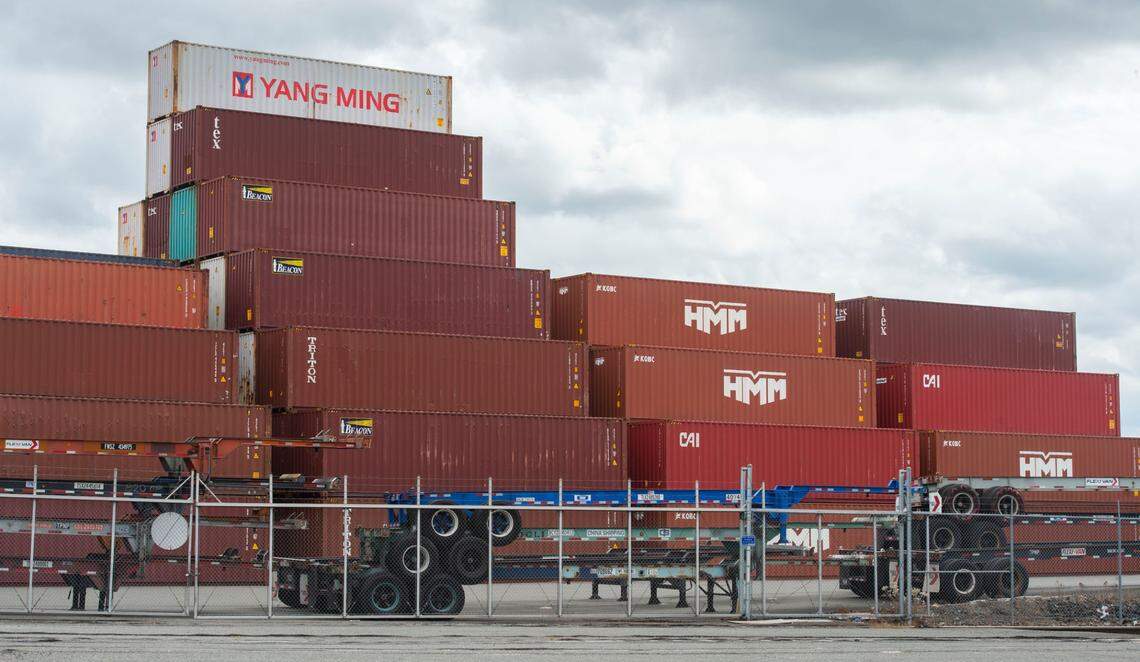 Containers are stacked seven-deep in some spots at the Washington United Terminals at the Port of Tacoma on Thursday, August 26, 2021. When shipping surged back this year in the pandemic’s wake, ports struggled to load and unload containers fast enough to keep up with the crush of ships waiting just offshore.
