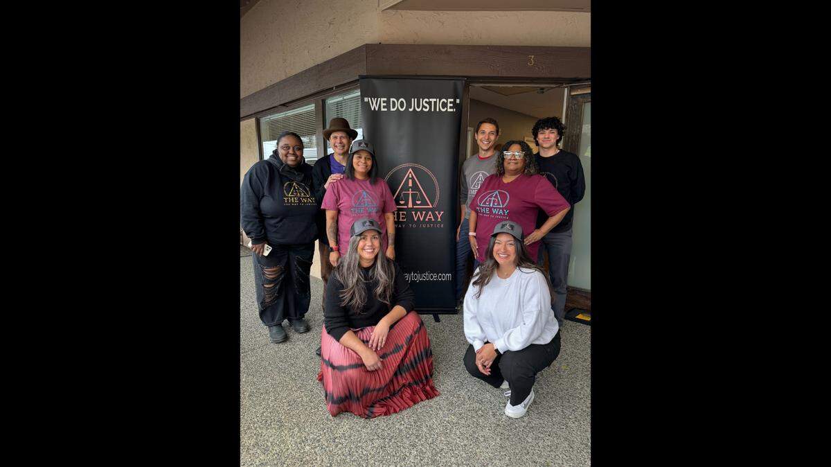 Leadership, attorneys and staff of The Way to Justice, a Spokane-based nonprofit lawfirm, pose for a photograph Wednesday, April 24, 2024 in front of the firm’s satellite office in Pierce County. Pictured from left are Alethea Dumas, director of community engagement; Arian Noma, staff attorney; Virla Spencer, CEO and cofounder; Camerina Zorrozua, legal director and cofounder. Pictured from right are Caleb Ohrtman, student intern; Erica Cleveland, outreach coordinator; Davi Kaplan Gomez, student intern, and Josiah Lara, staff attorney.